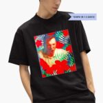 deon-toews-wearing-flowers-cale-makar-photo-shirt-1_n7twlg