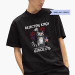 racoon-holding-freedom-crown-rejecting-kings-1776-shirt-1_g1y5hd
