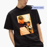 sam-bennett-holding-a-crying-marchand-photo-shirt-1_eqd9il